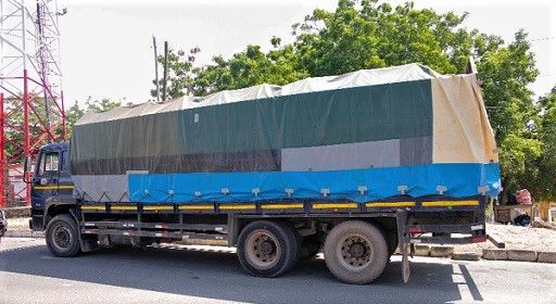 One of the articulated trucks loaded with fertiliser.